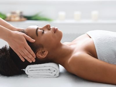 young-black-woman-getting-head-massage-from-massage-therapist.jpg young-black-woman-getting-head-massage-from-massage-therapist.jpg